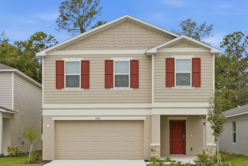 Photo of 13245 Tropical Breeze Way, Hudson, FL 34669 (MLS # TB8396167)