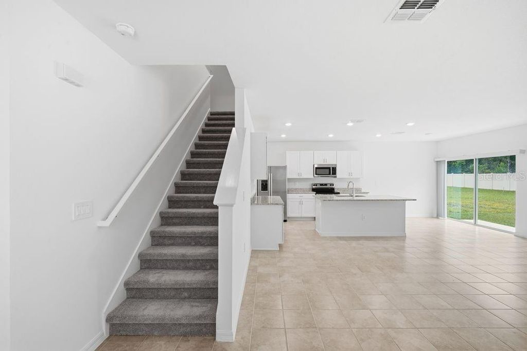 Photo of 13245 Tropical Breeze Way, Hudson, FL 34669 (MLS # TB8396167)