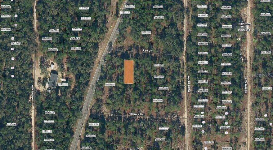 Leveled R-2 lot in Rainbow Lake Estates near paved Baden Powell Rd. Approx. 4,000 sq ft with easy access on a quiet dirt/grassy road. Power lines nearby; buyer to install well and septic if desired. No HOA. Minutes-drive to local lakes, trails, and recreation. Mobile homes permitted by county zoning; any RV use or pads are subject to county regulations. Appears to be outside FEMA flood zones; measurements, zoning/uses, utilities, setbacks, and suitability. Great option for a simple homesite, weekend base, or long-term hold. Property is in Rainbow Lake Estates with convenient access to Baden Powell Rd and regional lakes and trails. Lot is generally level with dirt/grassy access; public power lines are in the area. Buyer to confirm availability and cost of utility connections, and to install well and septic if desired. Zoning noted as R-2; buyer to confirm all permitted and conditional uses, including any rules related to mobile homes, RVs, setbacks, and minimum size requirements with the county. Property appears to be outside FEMA special flood hazard areas; buyer to verify with current maps. Seller acquired via tax-deed sale and expects to convey by Quit Claim Deed;