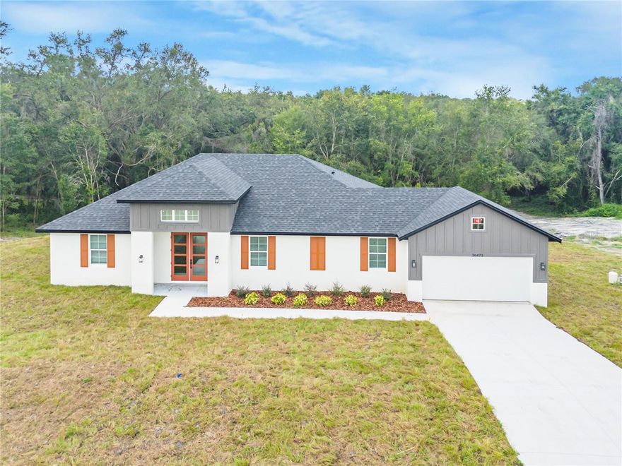 NEW CONSTRUCTION! We present an elegant residence featuring three bedrooms and two bathrooms situated on a generous lot in a tranquil setting with lakefront view. The interior design is distinguished by a modern kitchen, complete with a functional central island—ideal for culinary preparation or intimate gatherings. The living spaces flow with harmony, offering brightness and comfort in every corner. Its peaceful surroundings are perfect for those who value privacy, quality of life, and a serene ambiance. An exceptional opportunity for discerning buyers seeking style, functionality, and well-being in one remarkable home. Don't miss this amazing opportunity!
