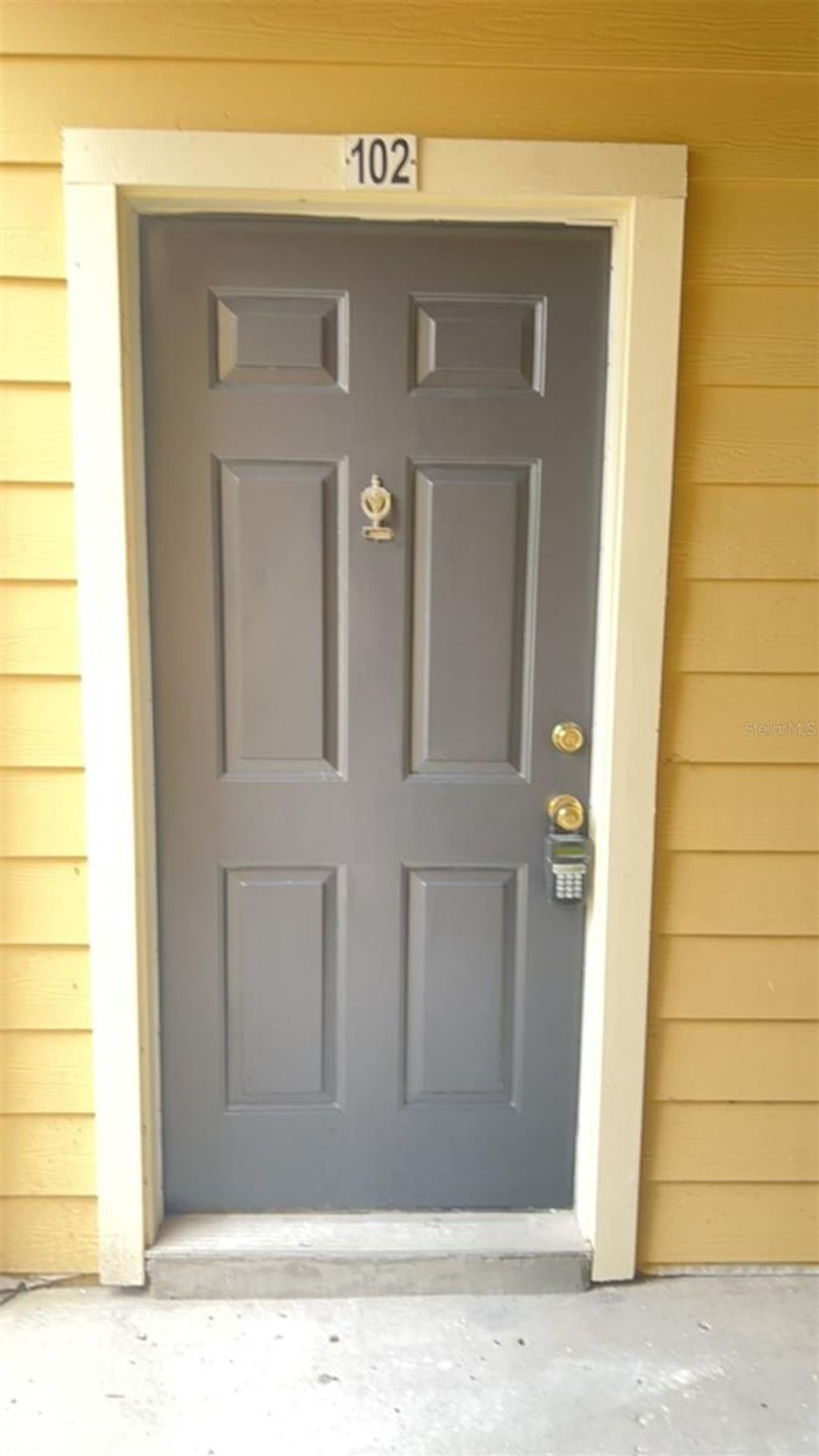 Photo of 8625 Fancy Finch Drive #102, Tampa, FL 33614 (MLS # TB8408061)