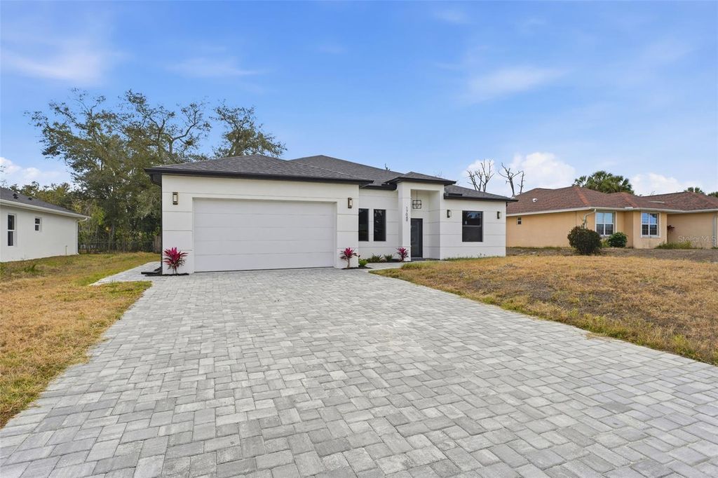 Photo of 17049 Hillsborough Boulevard, Port Charlotte, FL 33954 (MLS # C7519839)