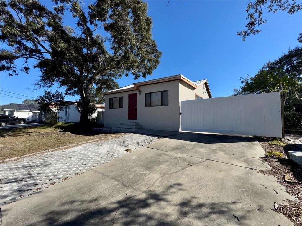 Photo of 9805 N 46th Street, Tampa, FL 33617 (MLS # TB8469287)