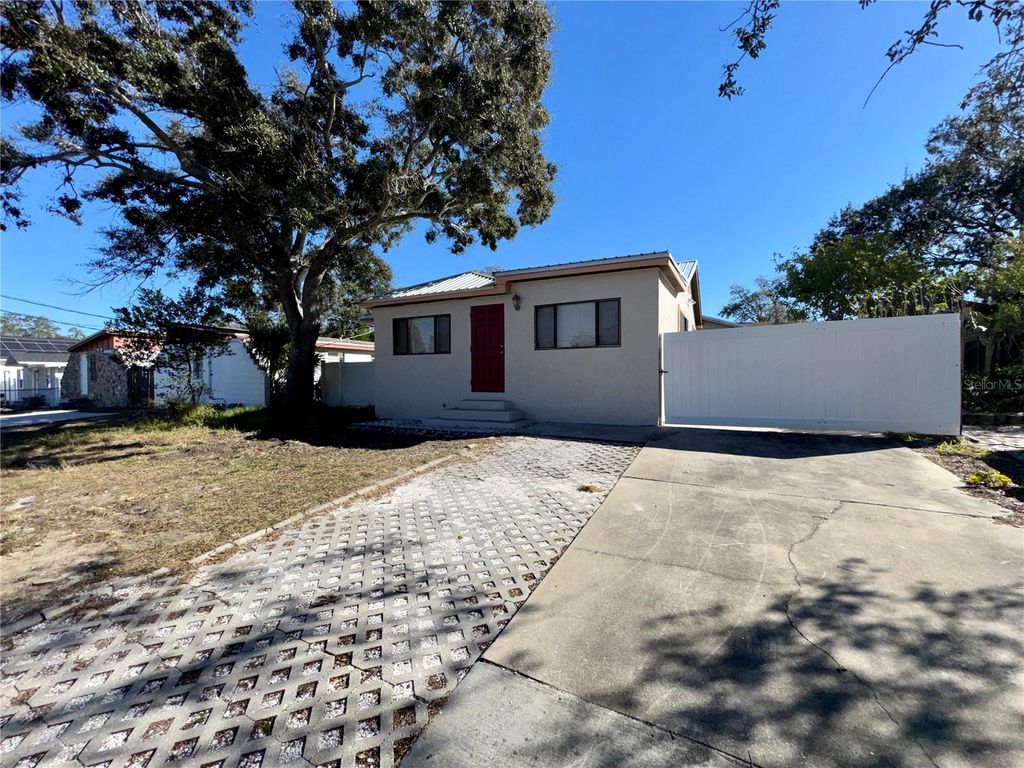 Photo of 9805 N 46th Street, Tampa, FL 33617 (MLS # TB8469287)