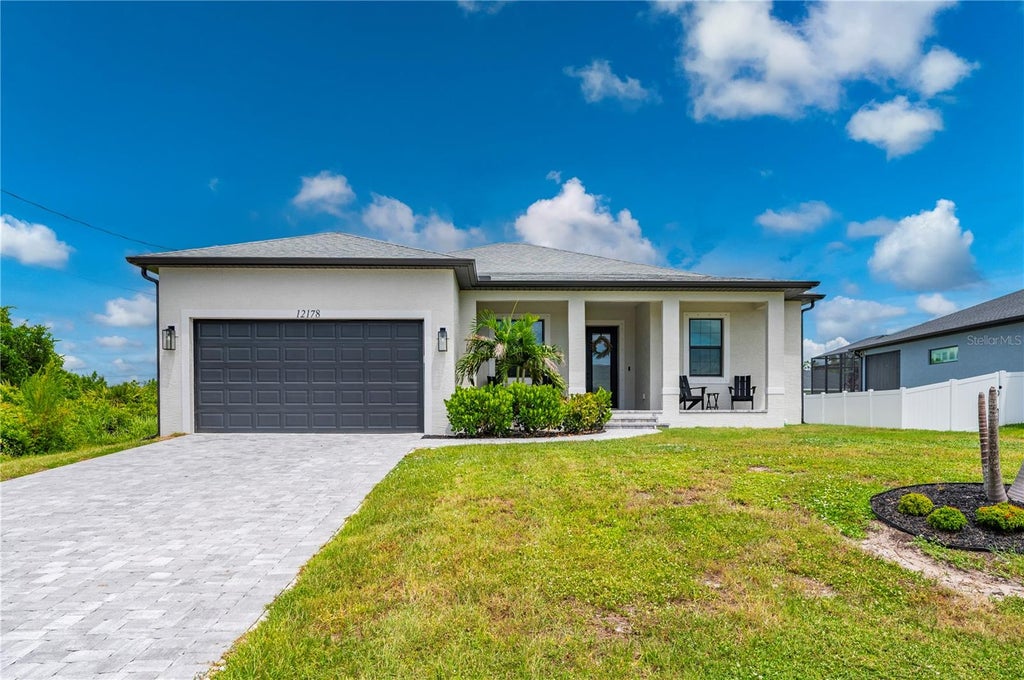 Photo of 12178 Foresman Boulevard, Port Charlotte, FL 33981 (MLS # C7530210)