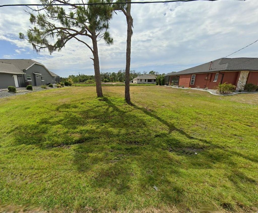 Photo of 231 Rotonda Circle, Rotonda West, FL 33947 (MLS # D6136849)