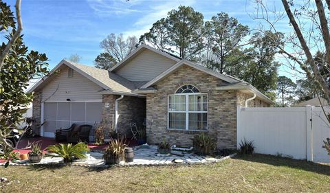 Photo of 34 Praver Lane, Palm Coast, FL 32164 (MLS # O6385836)