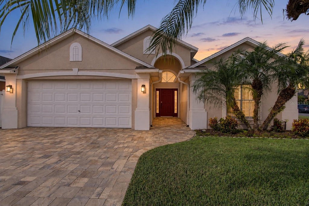 Photo of 3109 Heritage Park Way, Orlando, FL 32837 (MLS # O6452145)
