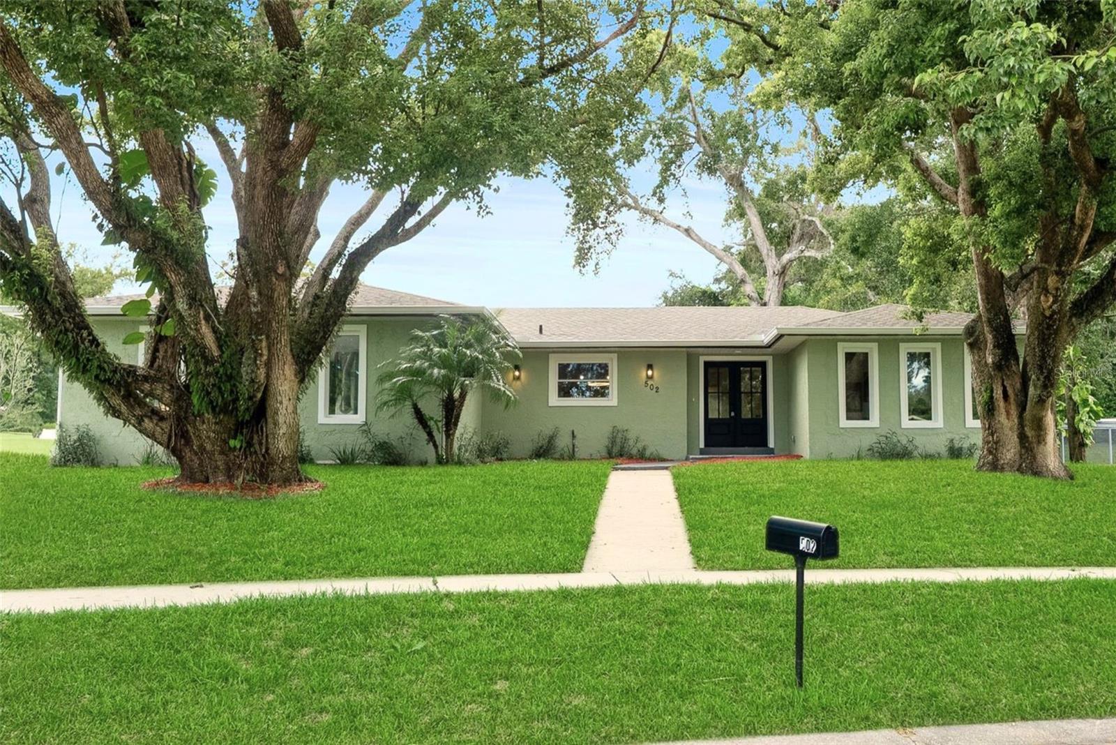 Welcome to your dream home in the heart of Altamonte Springs! This one-of-a-kind property has been COMPLETELY RENOVATED from top to bottom - every square inch thoughtfully designed with today’s lifestyle in mind – new roof, plumbing, electrical, HVAC, windows, landscaping + MORE! With BRAND-NEW EVERYTHING and high-end finishes throughout, it feels like new construction with the charm and character you can’t build today. Step inside and fall in love with the bright, open-concept layout where everything flows seamlessly into the dining and living spaces—perfect for entertaining or everyday living. The kitchen is the star of the home with BRAND NEW cabinetry, quartz counters, designer backsplash, and appliances—perfect for everyday living or entertaining with ease. Luxury vinyl plank runs throughout, tying the space together with style and durability. Need flexibility? The bonus room off the entry adapts to your life—whether that’s a chic home office, cozy den, or even a 4th bedroom. Your primary suite retreat is pure luxury: two oversized walk-in closets and a spa-worthy bathroom with an expansive walk-in shower, double vanities, and high-end finishes. Two additional bedrooms with built-in closets and a fully upgraded guest bath make the home as functional as it is beautiful. Peace of mind comes built-in. This home has been completely redone with major upgrades including a brand new 2025 ROOF, all-new PLUMBING and ELECTRICAL, a new HVAC system with DUCTS and VENTS, brand-new WINDOWS, a new WATER HEATER, and fresh interior and exterior PAINT. Step outside to find new landscaping—lush grass, trimmed trees, and fresh shrubs—giving the property a crisp, elevated curb appeal. Even the garage shines with epoxy flooring, fresh paint, and a new garage door. Set on a spacious 0.30-acre ELEVATED CORNER lot, the home features a brand-new paver patio perfect for outdoor living and entertaining. All of this, just minutes from Costco, popular restaurants, I-4, and everything Altamonte Springs has to provide. With an optional, very low HOA, you get the best of convenience and freedom. You don’t want to miss this opportunity to own this completely move-in ready home!