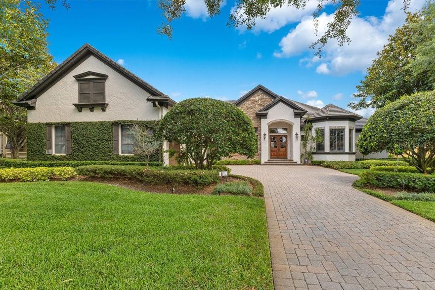 “New Price Improvement” Beautiful & unique Home in one of the most charming streets of Keene's pointe "Valhalla Way". Offering stunning views of the 17th hole of the Golden Bear Club golf course, designed by Jack Nicklaus. Great floor plan and breathtaking surroundings. Upon entering through its elegant wooden double doors, you are greeted by a welcoming foyer and formal dining room, followed by a wet bar area and a temperature-controlled wine cellar that holds up to 400 bottles.The extra-spacious kitchen is a chef’s dream, featuring high-end appliances, granite countertops, two dishwashers, two ovens, two sinks, and a hidden walk-in pantry. The open-concept layout flows seamlessly into the dining and living areas, making it ideal for both everyday living and entertaining. All main living spaces are conveniently located on the first floor, with an expansive bonus room and half bath upstairs—perfect for a home theater, gym, or man cave. One of the most magical features of this home, besides its impressive golf views is its spectacular bar and social area specially designed for entertaining. The screen-enclosed outdoor living space wraps around a large pool and bubbling spa, creating the perfect setting for relaxation and fun. The summer kitchen is equipped with a full sink, oversized natural gas grill, TV area, and a cozy fireplace, offering the ultimate outdoor living experience with picturesque views of the golf course. Keene’s Pointe is more than just an exclusive golf community — it’s a lifestyle. Residents enjoy 24-hour gated security and a wide array of world-class amenities, including pool, clubhouse bar, golf pro shop, fine dining restaurant, tennis courts, and more. Whether you’re a golf enthusiast or simply seeking a vibrant and secure community, Keene’s Pointe offers an unmatched living experience.