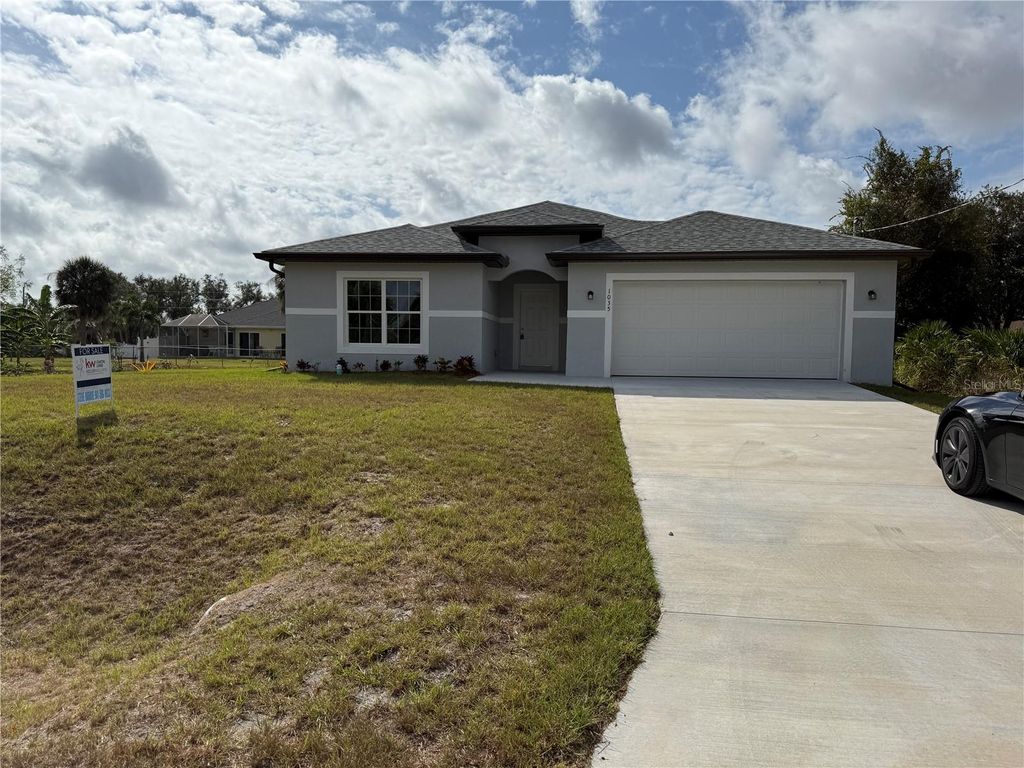 Photo of 1035 Cragmont Avenue, North Port, FL 34288 (MLS # A4673380)