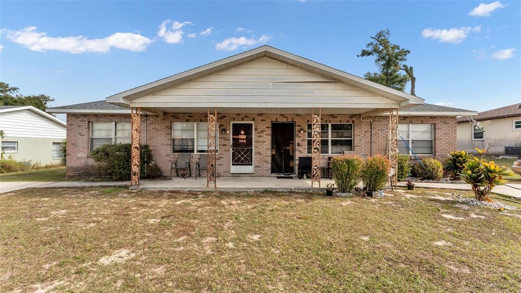 Photo of 880 Charmil Avenue, Lake Alfred, FL 33850 (MLS # L4958385)