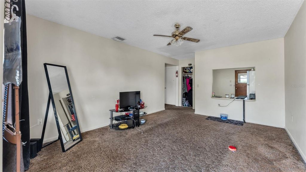 Photo of 880 Charmil Avenue, Lake Alfred, FL 33850 (MLS # L4958385)