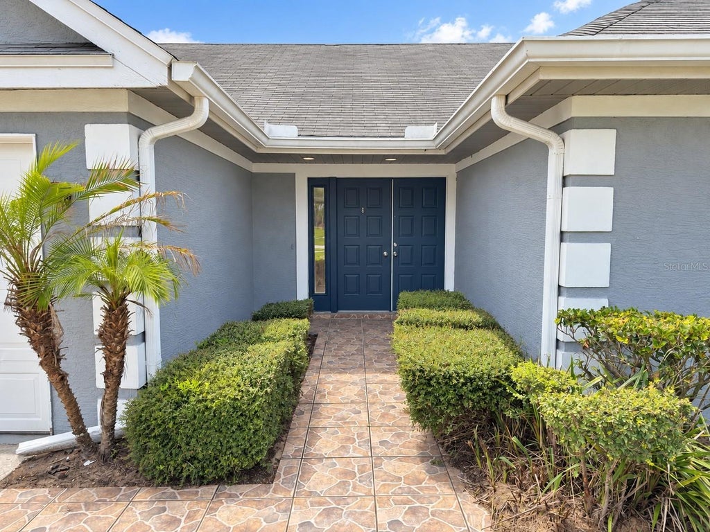 Photo of 6838 Merganser Drive, Orlando, FL 32810 (MLS # O6445223)