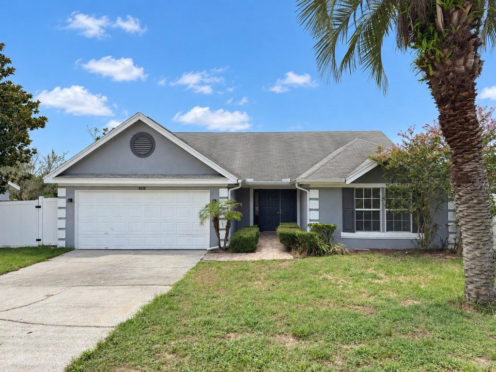 Photo of 6838 Merganser Drive, Orlando, FL 32810 (MLS # O6445223)