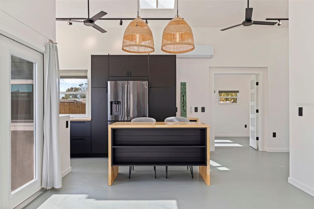 Photo of 890 65th Street S, St Petersburg, FL 33707 (MLS # TB8477587)