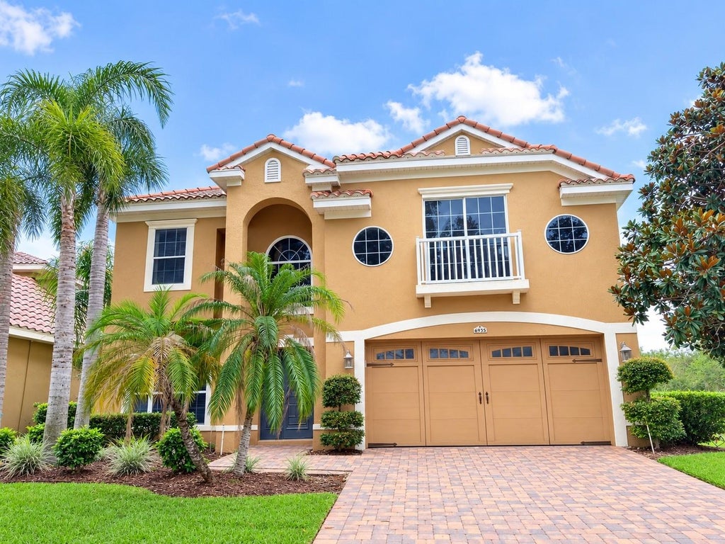 Photo of 6935 Brescia Way, Orlando, FL 32819 (MLS # O6430709)