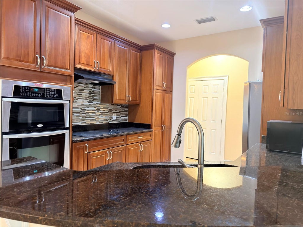 Photo of 6935 Brescia Way, Orlando, FL 32819 (MLS # O6430709)