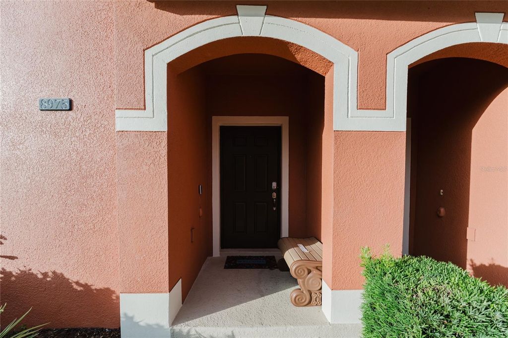 Photo of 8975 Bismarck Palm Road, Kissimmee, FL 34747 (MLS # O6365096)