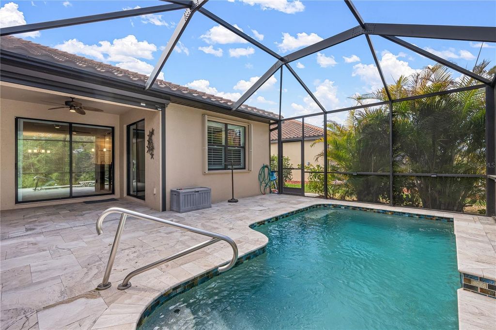 Photo of 12379 Amica Loop, Venice, FL 34293 (MLS # TB8481753)