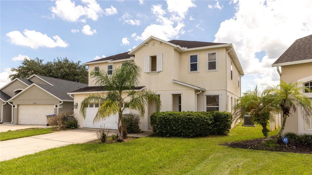 Photo of 2895 Blooming Alamanda Loop, Kissimmee, FL 34747 (MLS # O6434366)
