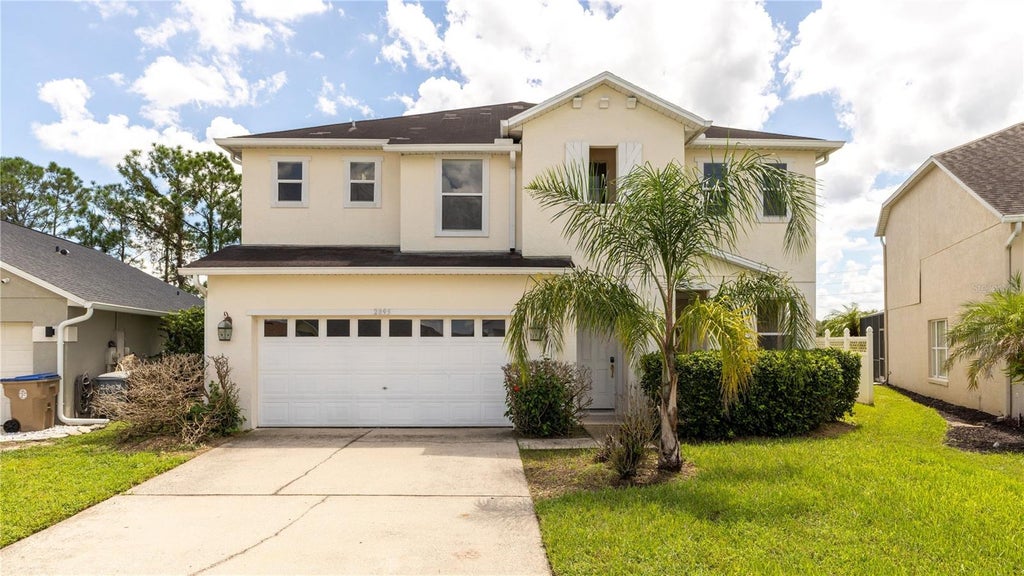 Photo of 2895 Blooming Alamanda Loop, Kissimmee, FL 34747 (MLS # O6434366)