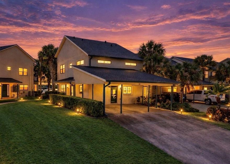 One or more photo(s) has been virtually staged. FLORIDA LIVING AT ITS FINEST! Come see this beautifully updated 3 Bedroom, 2.5 Bath water front end-unit condo with a dedicated boat slip complete with a 13,000 pound lift for up to a 30 FT boat. Yardarm is a gated condo community situated on a DEEP WATER CANAL with DIRECT ACCESS TO TAMPA BAY. From the moment you step inside you will appreciate this home's COZY BEACH VIBE accentuated by it's wood-look tile flooring throughout 1st floor & new shiplap wall in Living Room. KITCHEN COMPLETELY REMODELED  with granite countertops, soft-close wood cabinets with 42" uppers, LED under cabinet lighting, tile backsplash, & stainless steel appliances. Other improvements include NEW LIGHT FIXTURES/BLINDS & SHUTTERS/CEILING FANS (2021), REMODELED GUEST BATH (2020), NEW WATER HEATER (2024), NEW WASHER & DRYER (2025) REMODELED HALF BATH (2021) and LAMINATE FLOORING THROUGHOUT 2ND FLOOR. This home also features covered parking for two cars (plus a golf cart), screened rear lanai, extended composite deck, screened balcony with gorgeous water views, and two large attic storage spaces. Monthly HOA Fee covers the ROOF- NEW (3-19-26), exterior walls, mangrove trimming, exterior building insurance & Flood, grounds maintenance & landscaping, monthly pest control, trash, reserves, & common elements (pool, tennis court, & dock). No more need to pay pricey Marina storage fees when you have your own private boat slip/lift just steps from home! Great location within close proximity to schools, parks, restaurants, shopping, & the Apollo Beach Nature Preserve.  Schedule your showing today!