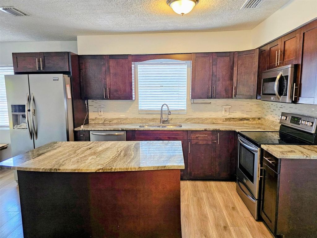 Photo of 3128 W Varn Avenue, Tampa, FL 33611 (MLS # TB8492276)