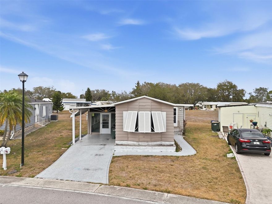 Welcome to this beautifully updated 2-bedroom, 2-bath manufactured home on fee simple land in a desirable gated 55+ community in North Port.  Major improvements provide peace of mind, including a new A/C (2024), hot water heater (2022), water softener (2023), and main roof replaced approximately six years ago with the kitchen roof area replaced in 2023.  The interior has been thoughtfully refreshed in 2026 with new luxury vinyl plank flooring, updated cabinets, new kitchen sink, commodes, ceiling fans, and modern recessed can lighting throughout. A spacious lanai, added in 2023, offers the perfect space to relax or entertain.  Homeowners’ fees of $2,430 annually are included in the property tax bill and cover lawn maintenance and access to community amenities. This gated community features a pool, clubhouse, and an active social calendar including bingo, movie nights, picnics, and more.
Conveniently located near shopping, dining, I-75, Wellen Park, spring training for the Tampa Bay Rays, and just a short drive to Englewood Beach.One resident must be 55+, with spouse eligibility beginning at 45+.
