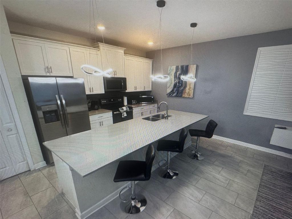 Photo of 4976 Windermere Avenue, Kissimmee, FL 34746 (MLS # S5141880)