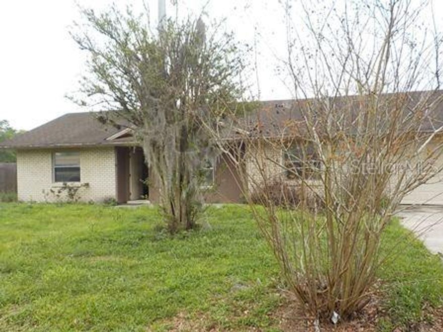 Wow , walking distance to Pear Brittan Plaza Publix!  This 3 bedroom 2 bath home is looking for a family to love it, a fenced yard for the fur baby, a screened porch for outside time.  Split bedroom plan, main bath has a shower.  Kitchen is spaceous and the dining room has sliders to go out to the screened porch.  The laundry is inside, so convenient! the one car garage can be a shop...or car parking, your choice.  Come make this home your own.  No sight unseen contracts, no assignables