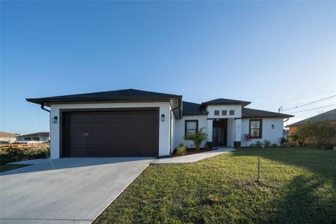 Photo of 2915 5th Street SW, Lehigh Acres, FL 33976 (MLS # TB8350595)