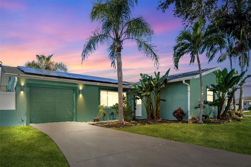 Welcome Home! A solid, smart, and seriously well-located non-evacuation zone home that checks the boxes and brings the extras. This 2 bed / 2 bath home offers 1,200+ sq ft of comfortable living space on a prime corner lot, with a fully fenced-in yard that’s perfect for pets, play, or your boat/RV storage. Here’s the standout feature: a 2022 roof plus solar panels with FULL BATTERY STORAGE—meaning when the power goes out, your fridge stays cold, the A/C keeps running, and the lights stay on. Peace of mind like that is hard to find. All of this in a great Seminole location close to everything you want—shopping, dining, parks, and the beaches—without the headache. If you’ve been waiting for a move-in-ready home with real value, modern efficiency, and a yard you can actually use… this is the one. Come see it before someone else does.