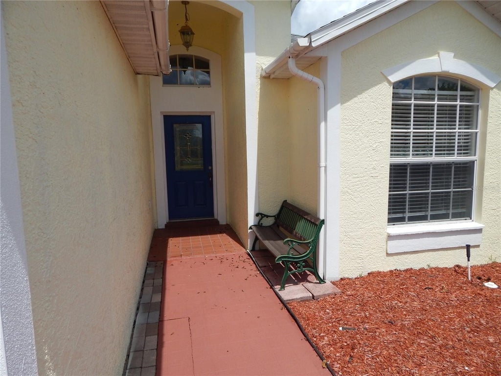 Photo of 102 Canary Island Circle, Davenport, FL 33837 (MLS # O6438879)