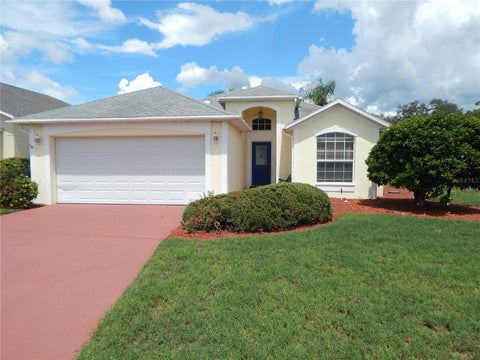Photo of 102 Canary Island Circle, Davenport, FL 33837 (MLS # O6438879)