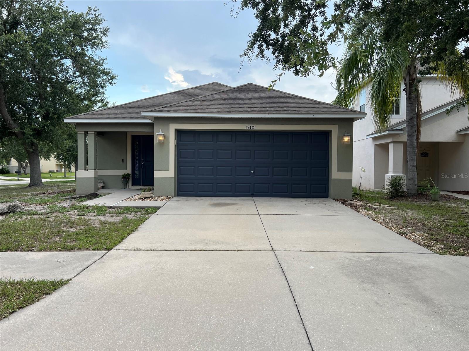 PRICED REDUCED! Welcome Home to this 3 bedroom, 2 bath home, on a CORNER, allowing for additional privacy. No carpets, beautiful wood-look ceramic tile for less maintenance. All appliances included, interior laundry room with washer & dryer included for added convenience. Enjoy this fenced-in corner property with plenty of room for entertaining. Two car garage, with additional parking on driveway. Conveniently close to major highway with close proximity to Tampa, various restaurants, hospital, shopping and several beach options. Need a lender? Please call for recommendations, if needed. Call today to schedule a showing.
