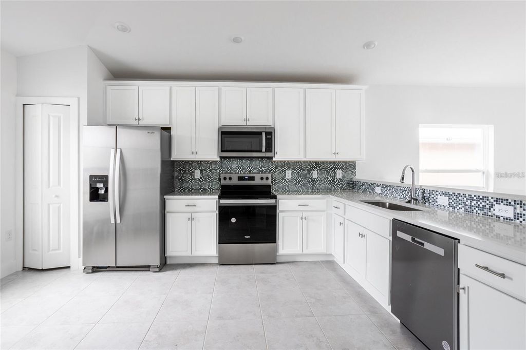 Photo of 425 Rose Apple Circle, Port Charlotte, FL 33954 (MLS # TB8429616)