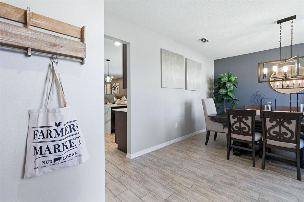 Photo of 262 E Fiesta Key Loop, Deland, FL 32720 (MLS # O6391747)