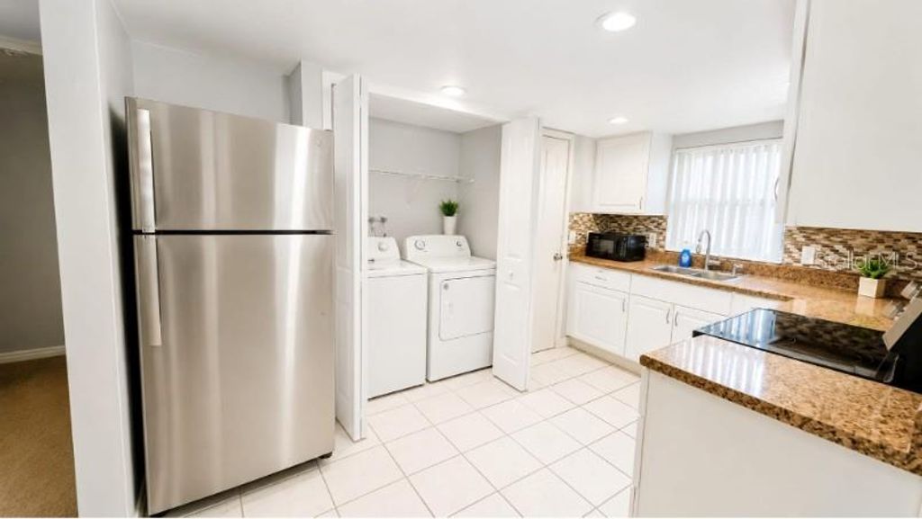 Photo of 9919 Turf Court #3, Orlando, FL 32837 (MLS # S5149555)