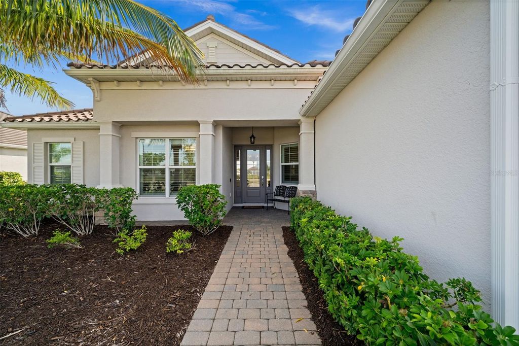 Photo of 15400 Spanish Point Drive, Port Charlotte, FL 33981 (MLS # D6145168)
