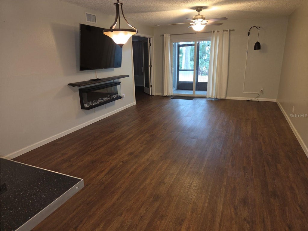 Photo of 5943 Calais Boulevard N #6, St Petersburg, FL 33714 (MLS # TB8562649)