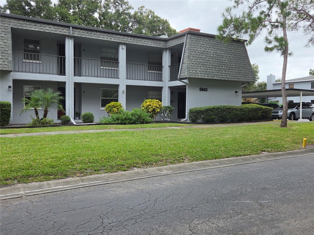 Photo of 5943 Calais Boulevard N #6, St Petersburg, FL 33714 (MLS # TB8562649)
