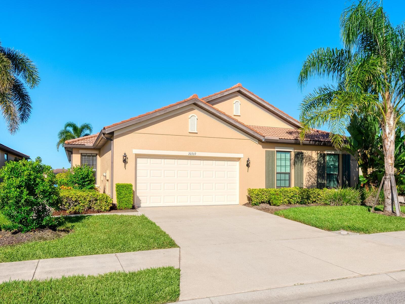 Enjoy shimmering lake views from this beautiful 2-bedroom plus den paired-villa, located in the sought-after 55+ resort-style community of Venetian Falls! The home features ceramic tile flooring throughout, fresh interior paint, crown molding, French doors to the den, and storm shutters for peace of mind. The updated kitchen offers a cozy dinette area, skylight, and stainless-steel appliances including newer refrigerator and GE range which includes convection cooking and air fryer. The Primary Suite showcases lake views, a large walk-in closet, and a ensuite bath with skylight, dual sinks, a Roman shower, and a private water closet. Designed for comfort and privacy, the guest bedroom and bath are located on the opposite side of the home. Relax or entertain on the tiled, screened lanai with two ceiling fans and roll-down sunshades, perfect for outdoor dining or enjoying tranquil lakefront scenes. Venetian Falls residents enjoy exceptional amenities—resort-style clubhouse, heated lap pool and spa, resistance-walking pool, fitness center, billiards room, bocce courts, and a full-time activities director. The HOA fee includes lawn care, irrigation, exterior painting, roof cleaning, internet, and basic cable—with no CDD fee. Ideally located just minutes from Gulf Coast beaches, shopping, dining, and historic downtown Venice, this home combines comfort, convenience, and resort-style living at its finest!