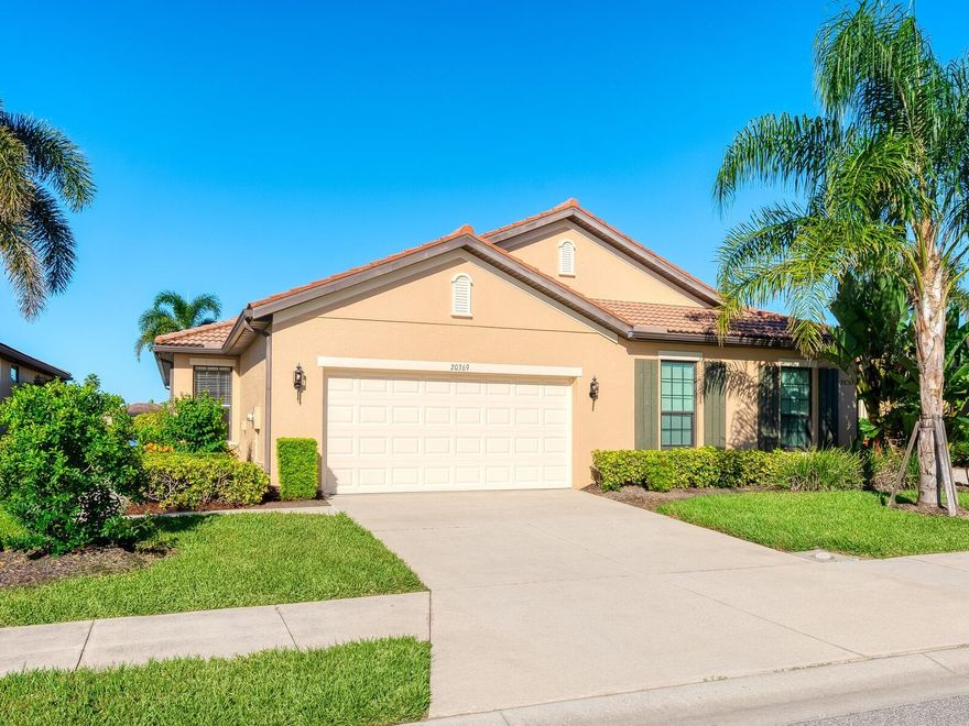 Enjoy shimmering lake views from this beautiful 2-bedroom plus den paired-villa, located in the sought-after 55+ resort-style community of Venetian Falls! The home features ceramic tile flooring throughout, fresh interior paint, crown molding, French doors to the den, and storm shutters for peace of mind. The updated kitchen offers a cozy dinette area, skylight, and stainless-steel appliances including newer refrigerator and GE range which includes convection cooking and air fryer. The Primary Suite showcases lake views, a large walk-in closet, and a ensuite bath with skylight, dual sinks, a Roman shower, and a private water closet. Designed for comfort and privacy, the guest bedroom and bath are located on the opposite side of the home. Relax or entertain on the tiled, screened lanai with two ceiling fans and roll-down sunshades, perfect for outdoor dining or enjoying tranquil lakefront scenes. Venetian Falls residents enjoy exceptional amenities—resort-style clubhouse, heated lap pool and spa, resistance-walking pool, fitness center, billiards room, bocce courts, and a full-time activities director. The HOA fee includes lawn care, irrigation, exterior painting, roof cleaning, internet, and basic cable—with no CDD fee. Ideally located just minutes from Gulf Coast beaches, shopping, dining, and historic downtown Venice, this home combines comfort, convenience, and resort-style living at its finest!