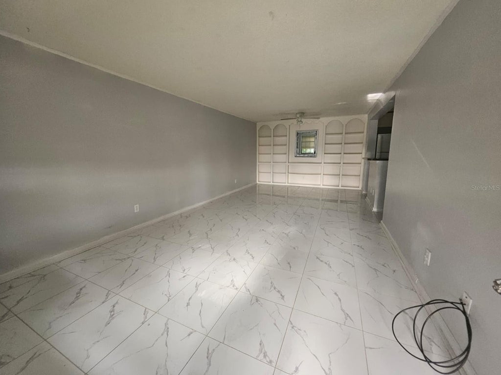 Photo of 4399 E Michigan Street #4399, Orlando, FL 32812 (MLS # O6449776)