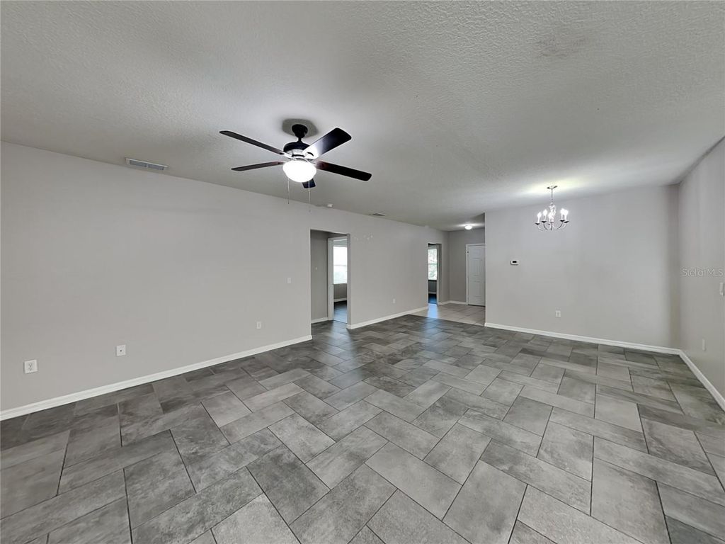 Photo of 3074 Brenton Manor Loop, Winter Haven, FL 33881 (MLS # O6353844)