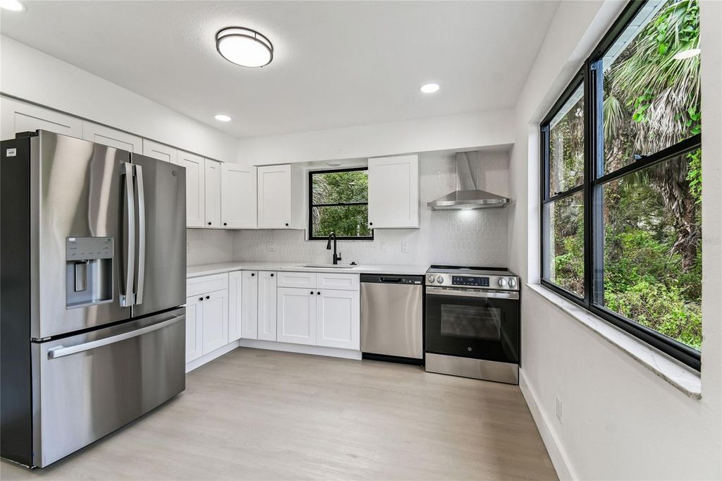 Photo of 16107 Sea Pines Drive, Hudson, FL 34667 (MLS # TB8443272)