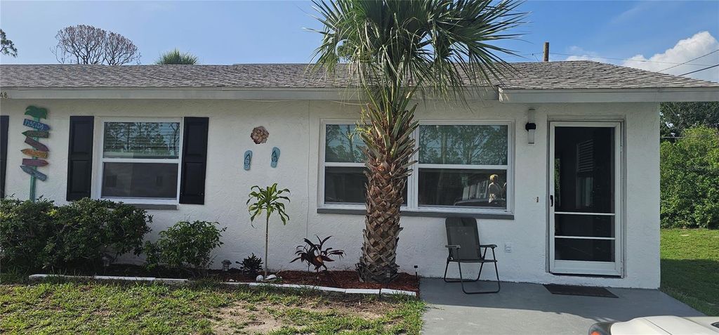 Photo of 12048 Henley Avenue #B, Port Charlotte, FL 33981 (MLS # A4676745)