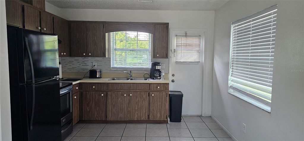 Photo of 12048 Henley Avenue #B, Port Charlotte, FL 33981 (MLS # A4676745)