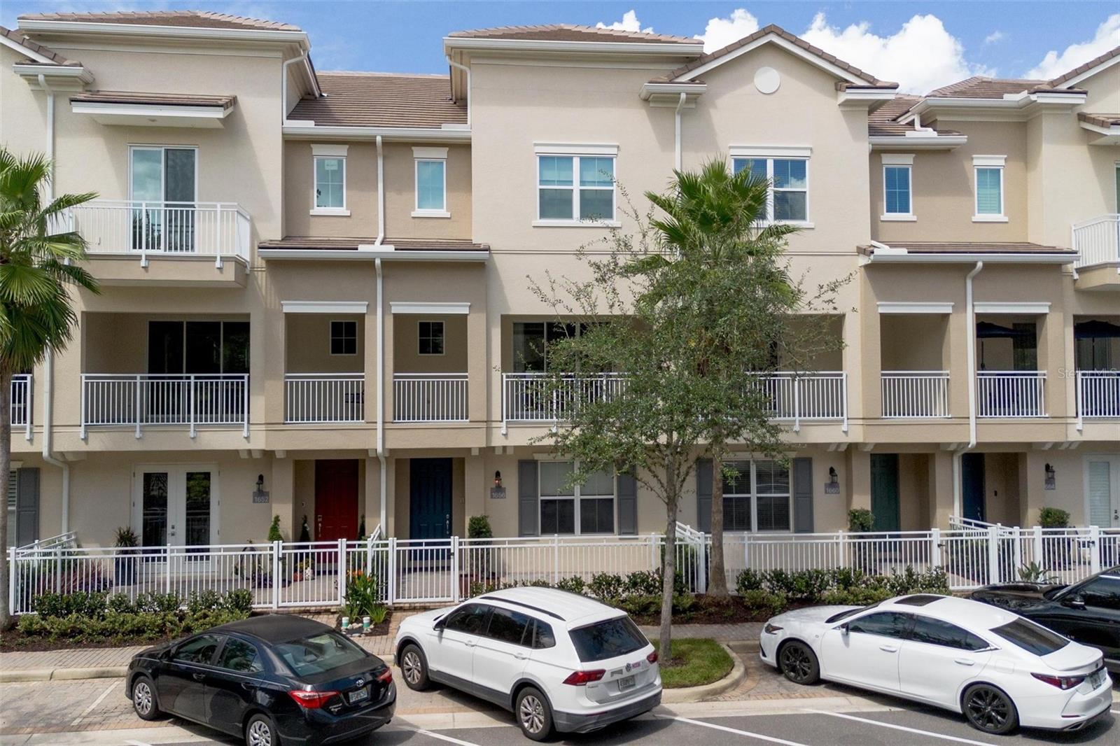 Experience upscale, carefree living in this beautifully updated townhome located in the highly sought-after gated community of GRANDE OAKS AT HEATHROW. Perfectly situated in Lake Mary’s vibrant business district, this home puts you steps from bike and walking trails, fine dining, boutique coffee shops, wine bars, shopping, and more—truly vacation living every day.
This stunning three-bedroom, three-and-a-half-bath residence with a two-car garage boasts pristine condition throughout. Enter through a private, fenced paver patio into a ground-floor entry that features a versatile flex room with double glass doors—ideal for an office, home gym, or guest space—along with a full bath, under-stair storage, and direct garage access.
Upstairs, the main level offers a refined living room with copper tray ceiling, crown molding, a spacious and inviting dining area. The gourmet kitchen impresses with an oversized island with bar seating, abundant 42" soft-close cabinetry and drawers, upgraded stainless steel appliances and elegant crown molding. Enjoy an abundance of natural light from brand-new 2025 windows, and step out onto the expansive balcony with custom electric screens overlooking tranquil pond views.
On the upper level, retreat to a generously sized primary suite with a beautifully finished tray ceiling and custom drapery and room darkening shades, an oversized walk-in closet with upgraded elfa shelving, and a luxurious en-suite bath with double sinks. Two additional bedrooms, a full bath, and a convenient laundry closet complete this floor.
No detail has been overlooked: a solid wood staircase and railings, upgraded window coverings featuring custom drapery, shades, and valances from The Shade Store, and additional elfa shelving throughout. Also, for additional peace of mind a New Roof was installed in 2025. Community amenities include a resort-style pool, fitness center, clubhouse, playground, scenic sidewalks, and a picturesque pedestrian bridge over a pond with a lighted fountain. Furniture conveys with the sale.
Enjoy easy access to I-4, 429, and 417, making commutes to Florida’s beaches, downtown Orlando, top attractions, and both Sanford and Orlando airports effortless. This is refined, resort-style living at its finest!